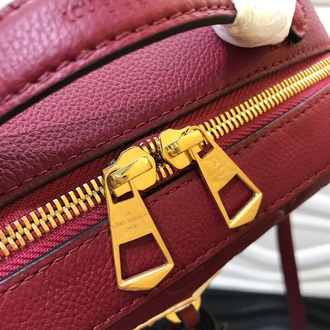 L0vis Vvtt0n Monogram Empreinte Saintonge Replica Bag Rose M44606