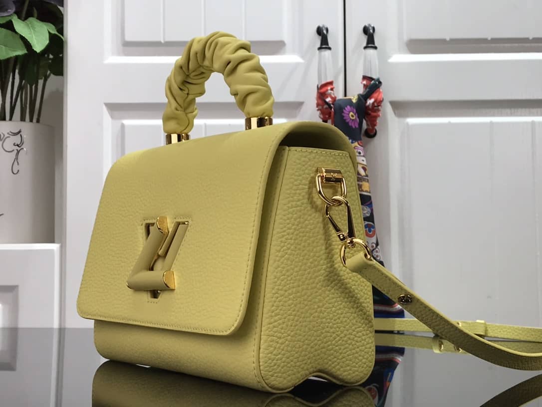 L0vis Vvtt0n Replica Bags Twist PM Pondichery Taurillon Leather Replica Bag Yellow M58691
