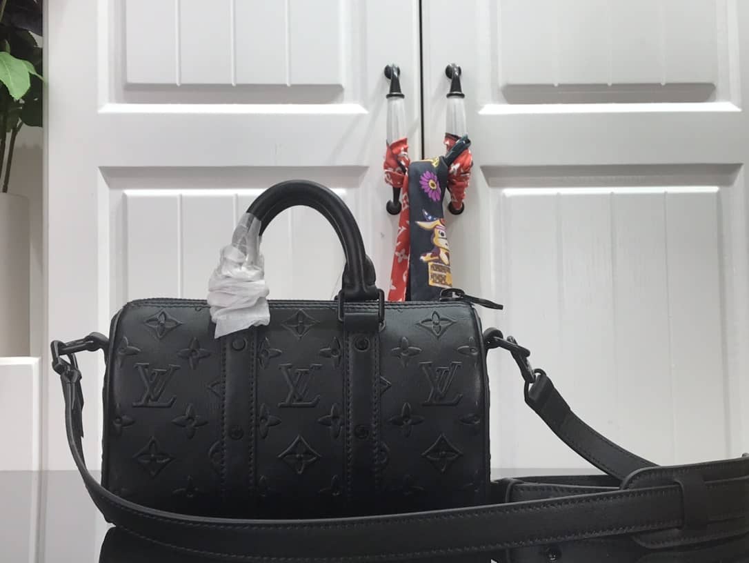 L0vis Vvtt0n Keepall XS Monogram Seal Cowhide Leather Bag Replica Black M57960