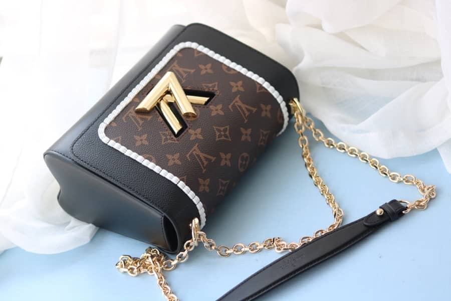 L0vis Vvtt0n Textured Epi Leather Twist Series Bag