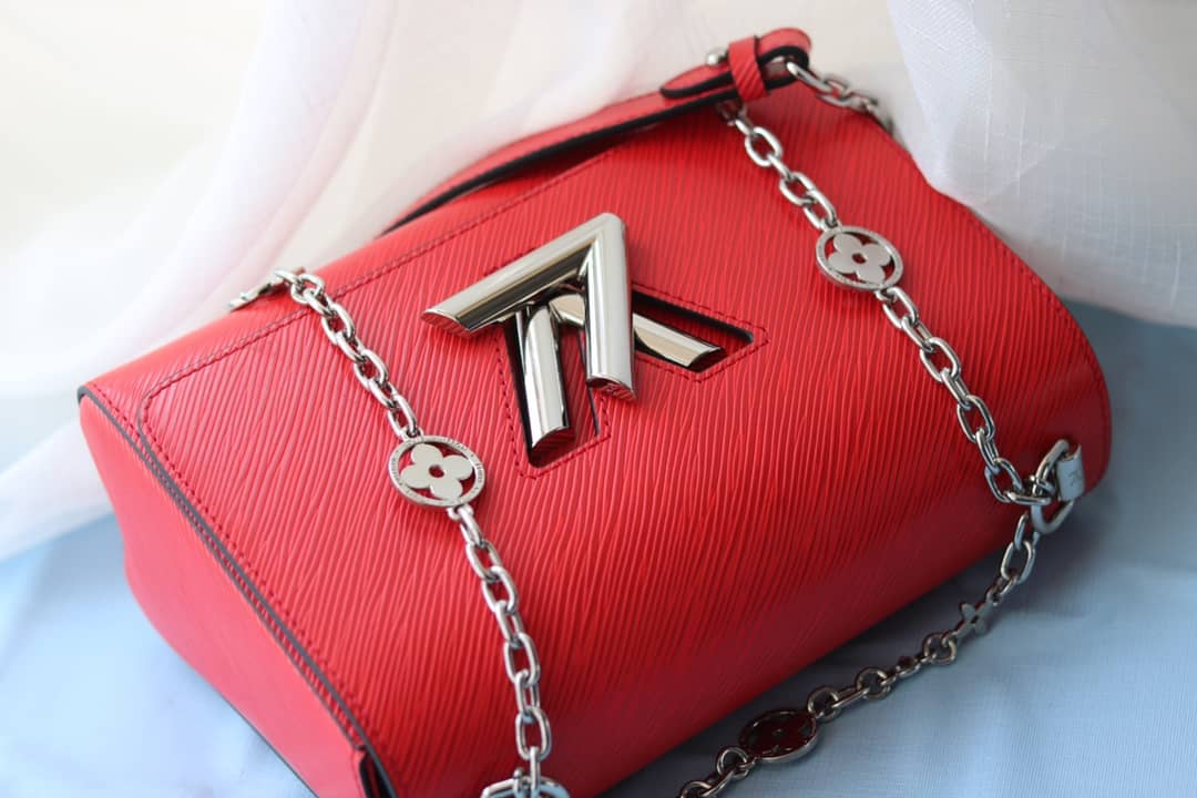 L0vis Vvtt0n Textured Epi Leather Twist Series Bag