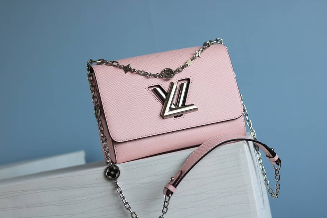 L0vis Vvtt0n Textured Epi Leather Twist Series Bag