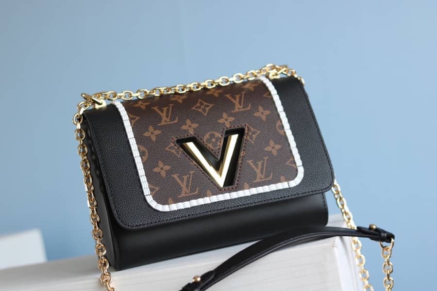 L0vis Vvtt0n Textured Epi Leather Twist Series Bag