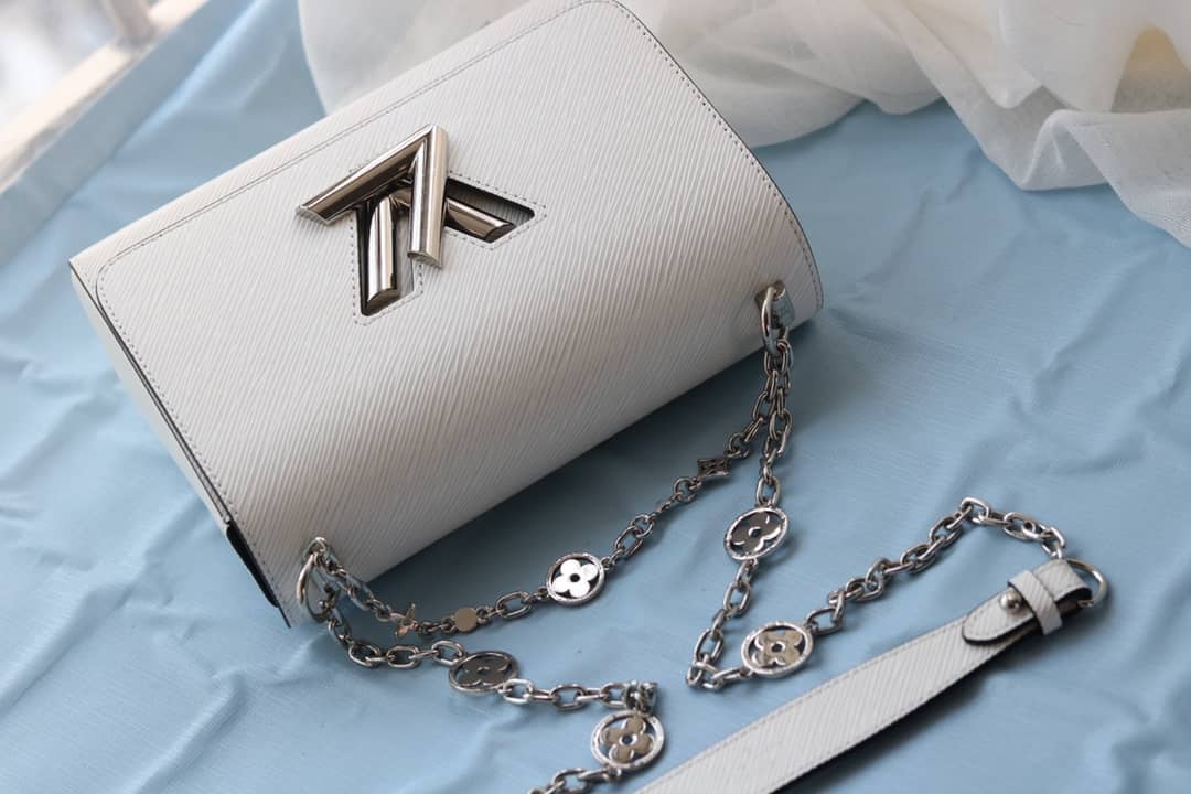 L0vis Vvtt0n Textured Epi Leather Twist Series Bag