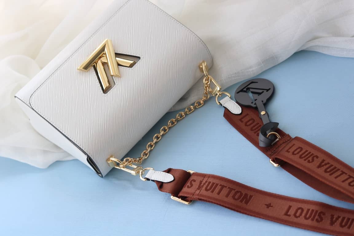 L0vis Vvtt0n Textured Epi Leather Twist Series Bag
