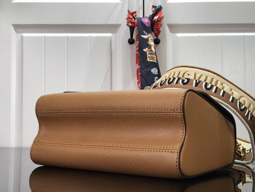 L0vis Vvtt0n Twist MM Golden Lock Handle Epi Leather Replica Crossbody Bag M57506