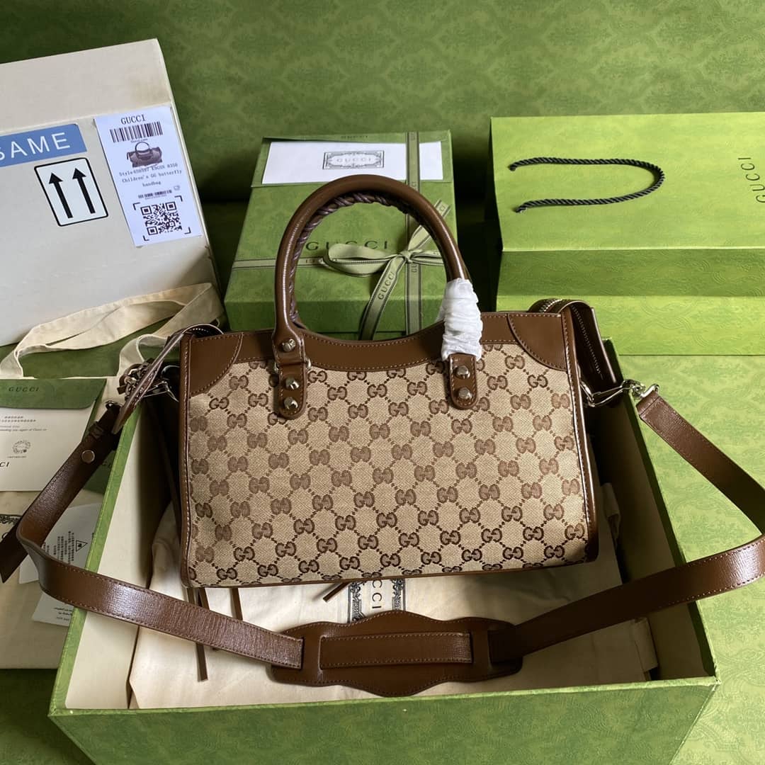 Gvc*1 x Ba1en*iaga GG Canvas City Bag Replica 658597