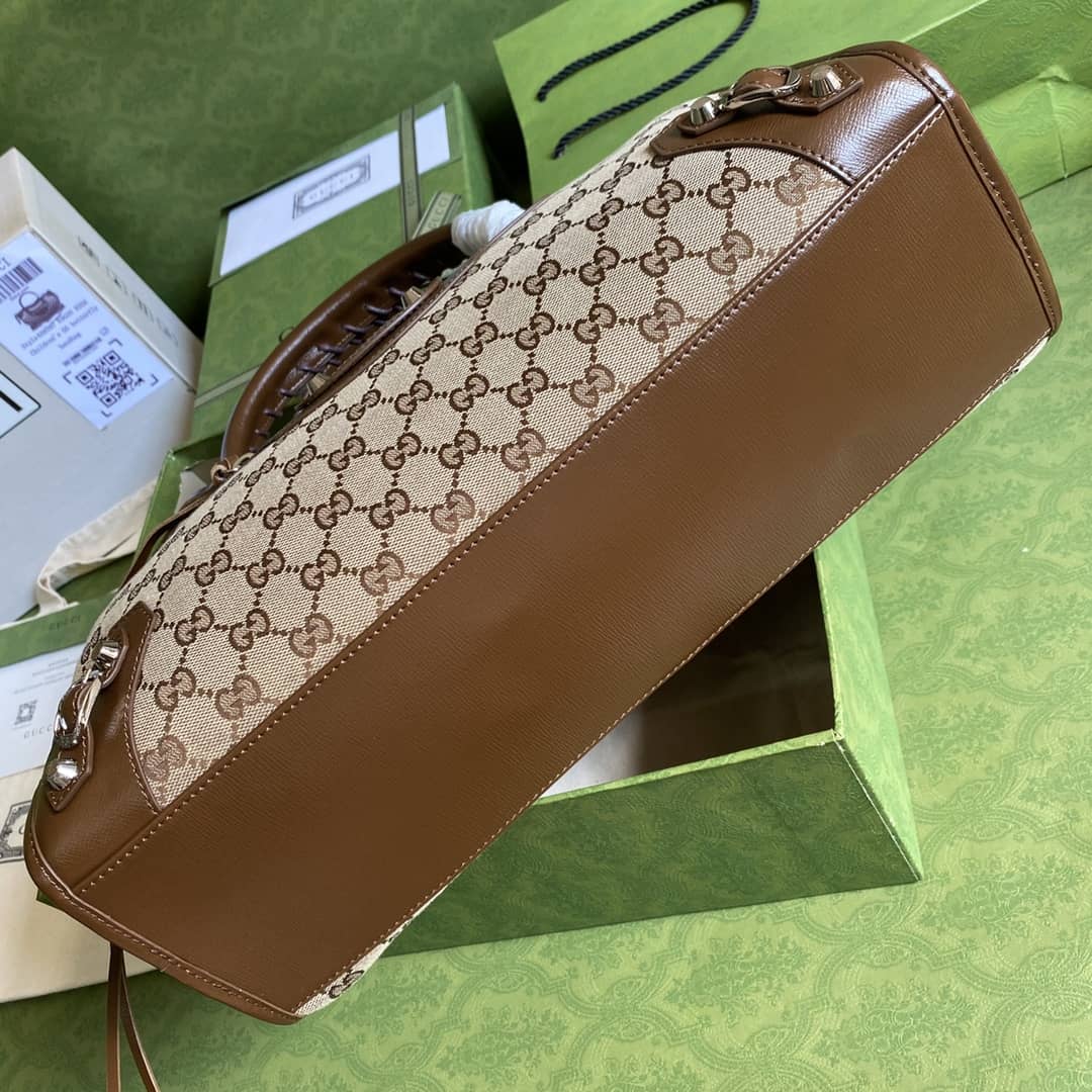 Gvc*1 x Ba1en*iaga GG Canvas City Bag Replica 658597