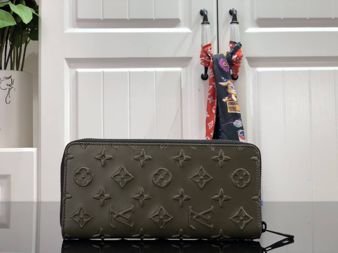 L0vis Vvtt0n Wallet Dupe Zippy Veltical Monogram Seal M80505